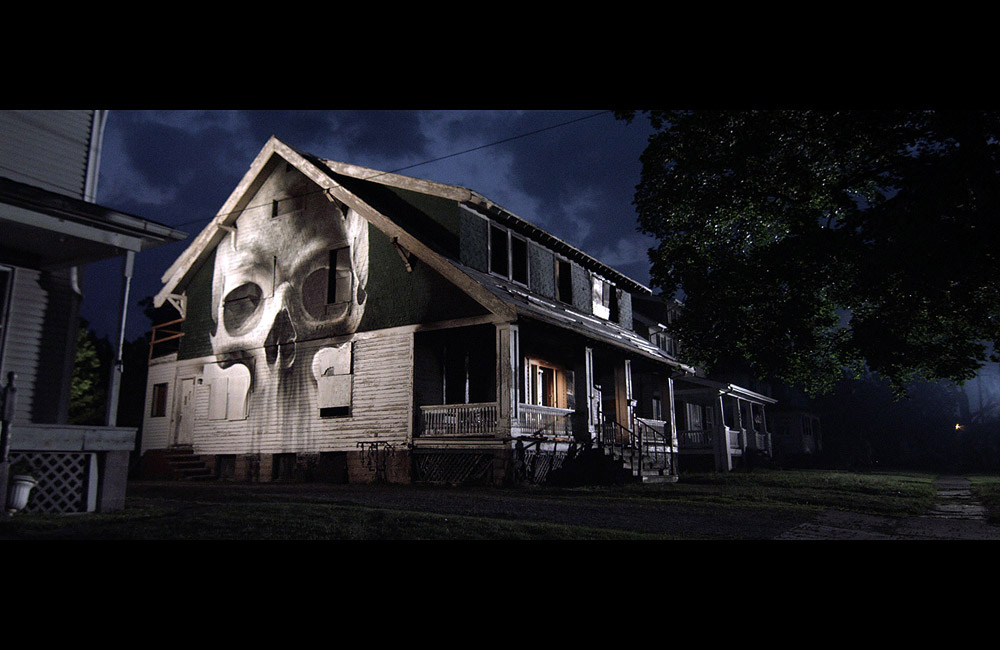 10-IAN-STRANGE-SUBURBAN-skull_house_home-stillframe-from-film-videoart-multi-channel-loop